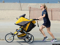photo: anna paquin runs with baby stroller